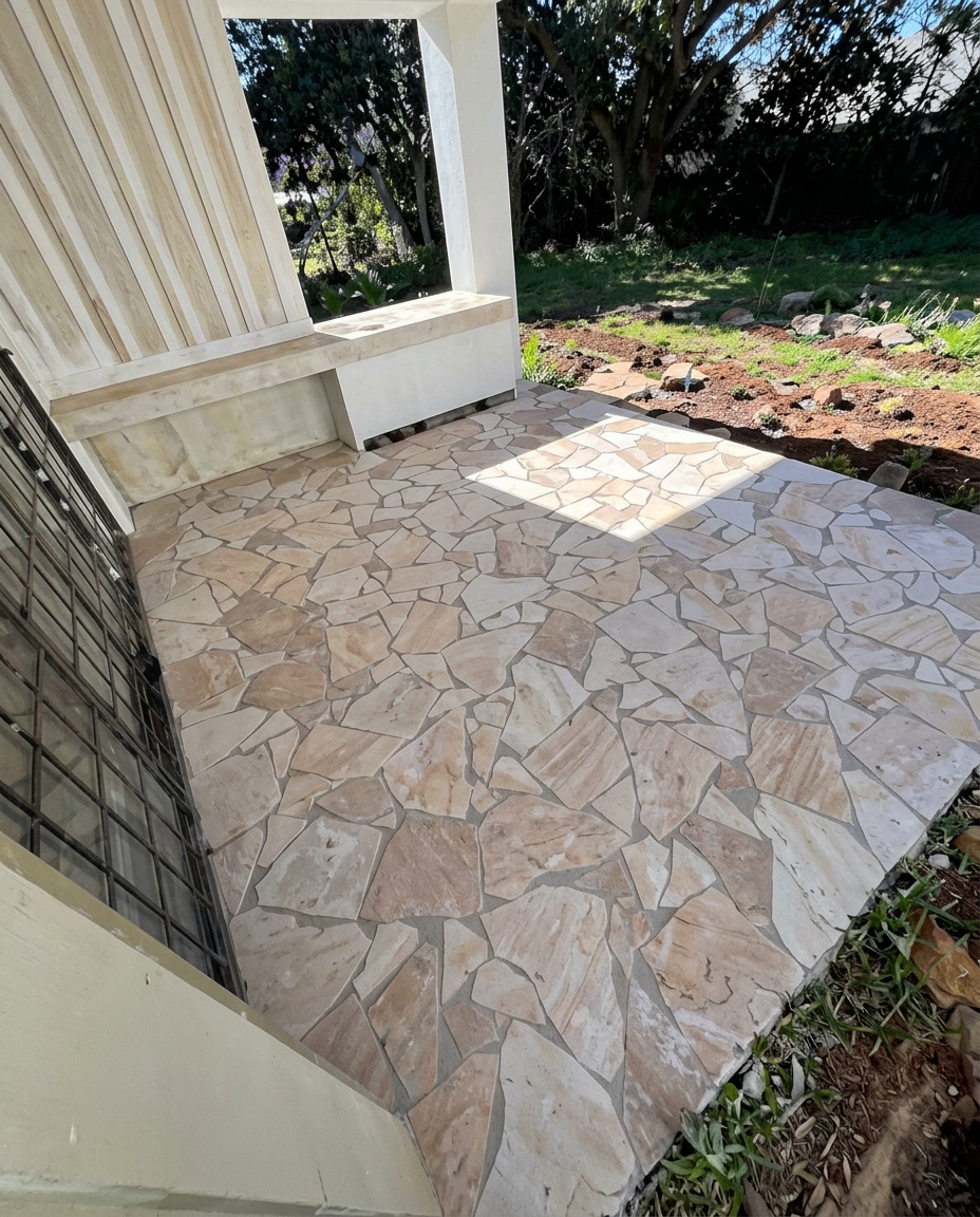 Detailed patterned patio tiling by Mazar Tiling and Paving Services